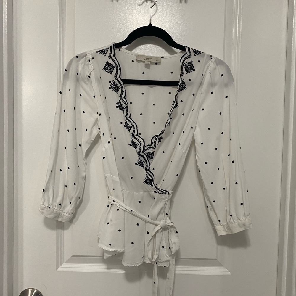 White with Black Polka dots, Tie Waist blouse with Black Eyelet edge.